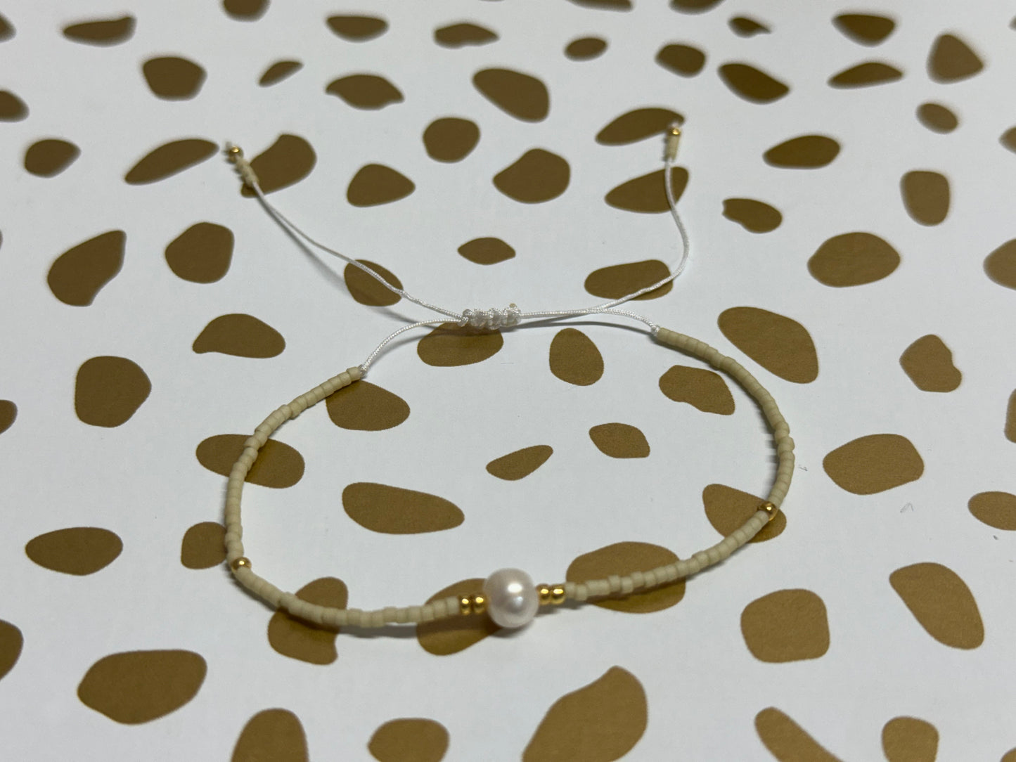 Bracelet- Beige and Gold Beads and a Water Pearl